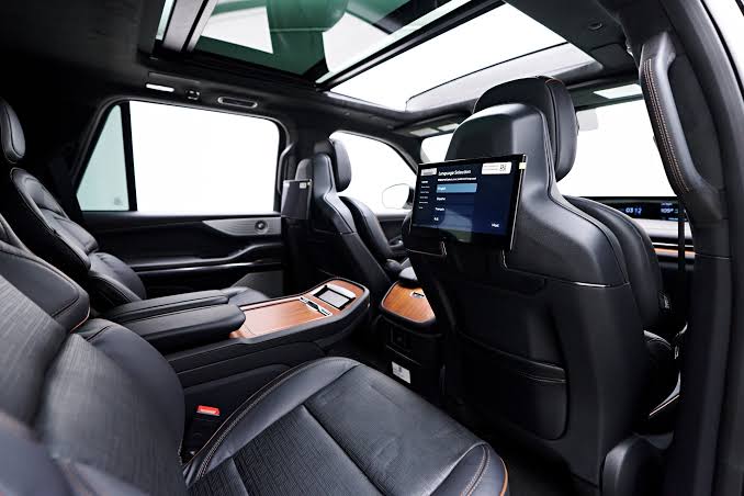 Premium stretch limo interior with custom fiber optic lighting for Tampa events